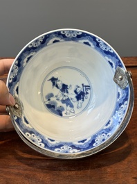 A Chinese blue and white bowl depicting playing boys and ladies with a mounted silver handle, Chenghua mark, Kangxi