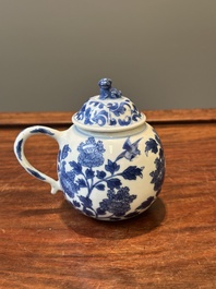 A Chinese blue and white mustard jar and cover with floral design, Kangxi