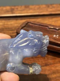 A group of Chinese carvings of lapis lazuli, pink quartz and other precious stones, with several stands, 19/20th C.