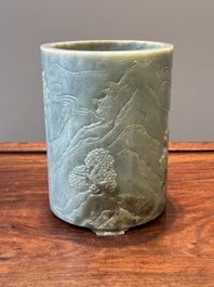 A Chinese spinach jade brush pot with relief design, 18th C.