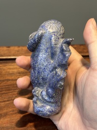 A group of Chinese carvings of lapis lazuli, pink quartz and other precious stones, with several stands, 19/20th C.