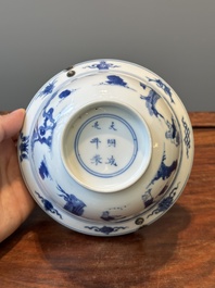 A Chinese blue and white bowl depicting playing boys and ladies with a mounted silver handle, Chenghua mark, Kangxi