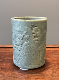 A Chinese spinach jade brush pot with relief design, 18th C.