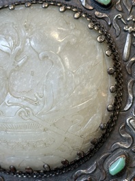 A Chinese white jade-mounted and gemstone inlaid silver hand mirror, 19/20th C.