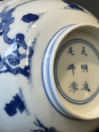 A Chinese blue and white bowl depicting playing boys and ladies with a mounted silver handle, Chenghua mark, Kangxi