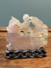 A group of Chinese carvings of lapis lazuli, pink quartz and other precious stones, with several stands, 19/20th C.