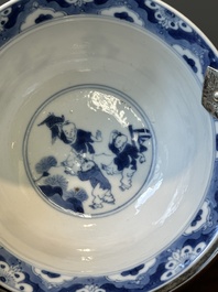 A Chinese blue and white bowl depicting playing boys and ladies with a mounted silver handle, Chenghua mark, Kangxi