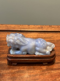 A group of Chinese carvings of lapis lazuli, pink quartz and other precious stones, with several stands, 19/20th C.