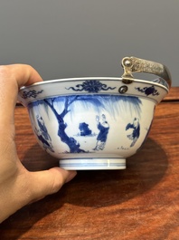 A Chinese blue and white bowl depicting playing boys and ladies with a mounted silver handle, Chenghua mark, Kangxi