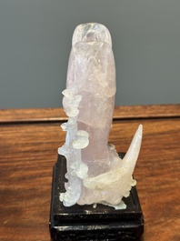 A group of Chinese carvings of lapis lazuli, pink quartz and other precious stones, with several stands, 19/20th C.