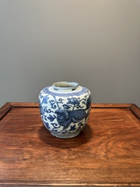 A Chinese blue and white 'Buddhist lion and lotus scroll' jar, Wanli