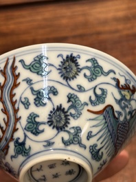 A Chinese doucai conical 'phoenixes' bowl, Chenghua mark, Kangxi/Yongzheng