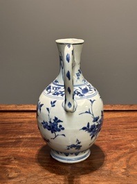 A Chinese blue and white ewer with floral design, Transitional period