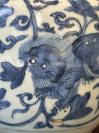A Chinese blue and white 'Buddhist lion and lotus scroll' jar, Wanli