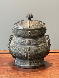 A Chinese bronze ritual wine vessel and cover, 'you', Yuan/Ming