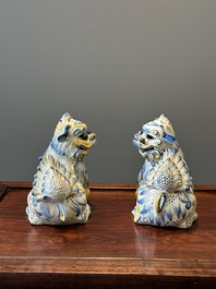 A pair of Portuguese polychrome faience sculptures of lions, 17/18th C.