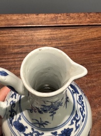 A Chinese blue and white ewer with floral design, Transitional period