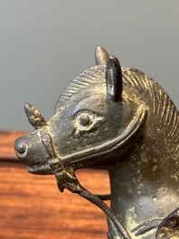 A rare Chinese partly lacquered and gilt bronze incense holder in the shape of a horse, Yuan/early Ming