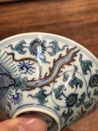 A Chinese doucai conical 'phoenixes' bowl, Chenghua mark, Kangxi/Yongzheng
