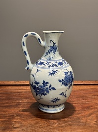 A Chinese blue and white ewer with floral design, Transitional period