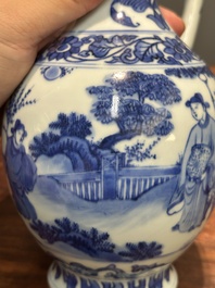 A Chinese blue and white ewer with figures in a landscape, Transitional period