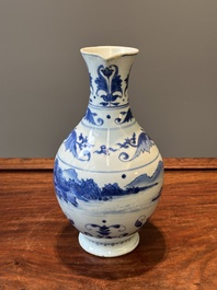 A Chinese blue and white ewer with landscape design, Transitional period