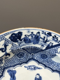 A Chinese blue and white plate with a punishment scene, Yongzheng/Qianlong