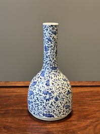 A Chinese blue and white 'lotus scroll' bottle vase, Yongzheng mark and possibly of the period