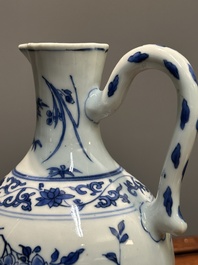 A Chinese blue and white ewer with floral design, Transitional period