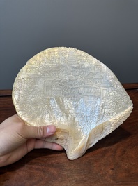 Five Chinese carved mother-of-pearl shells on wooden stands, Canton, 19th C.