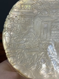 Five Chinese carved mother-of-pearl shells on wooden stands, Canton, 19th C.