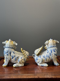 A pair of Portuguese polychrome faience sculptures of lions, 17/18th C.