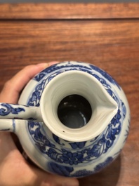 A Chinese blue and white ewer with figures in a landscape, Transitional period