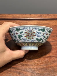 A Chinese doucai 'lotus scroll' bowl, Qianlong mark and of the period