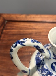 A Chinese blue and white ewer with figures in a landscape, Transitional period