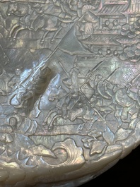 Five Chinese carved mother-of-pearl shells on wooden stands, Canton, 19th C.