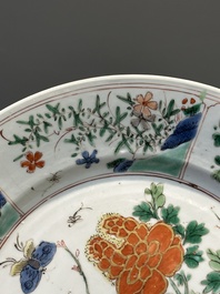 Three Chinese famille verte plates and a teapot, Kangxi