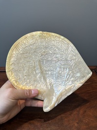 Five Chinese carved mother-of-pearl shells on wooden stands, Canton, 19th C.