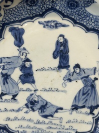 A Chinese blue and white plate with a punishment scene, Yongzheng/Qianlong