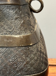 A Chinese archaistic bronze 'fanghu' vase, Ming