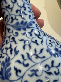 A Chinese blue and white 'lotus scroll' bottle vase, Yongzheng mark and possibly of the period