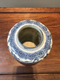 A Chinese blue and white 'Buddhist lion and lotus scroll' jar, Wanli