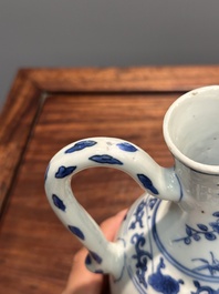 A Chinese blue and white ewer with floral design, Transitional period