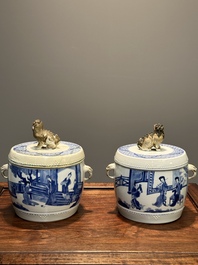 A pair of Chinese blue and white drum-shaped jars and cover, Jiajing mark, Kangxi