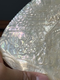 Five Chinese carved mother-of-pearl shells on wooden stands, Canton, 19th C.