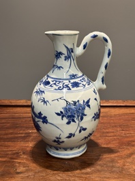 A Chinese blue and white ewer with floral design, Transitional period