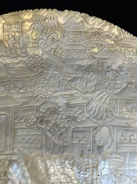 Five Chinese carved mother-of-pearl shells on wooden stands, Canton, 19th C.