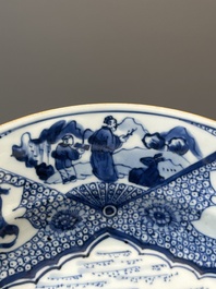 A Chinese blue and white plate with a punishment scene, Yongzheng/Qianlong