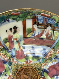 A pair of Chinese blue and white Canton-decorated plates, a famille rose 'playing boys' plate and a reticulated plate, 19th C.