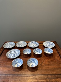 A collection of 23 Chinese cups and saucers, Kangxi/Qianlong